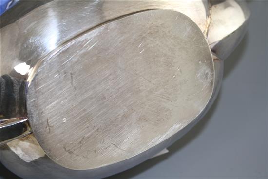 A modern silver teapot, Poston Products Ltd, Sheffield, 1977, gross weight, 25.5 oz.